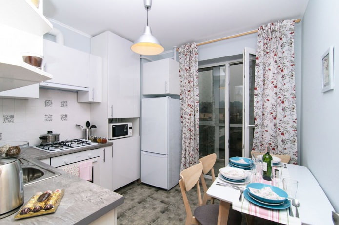 kitchen in white in a studio apartment kitchen in white in a studio apartment