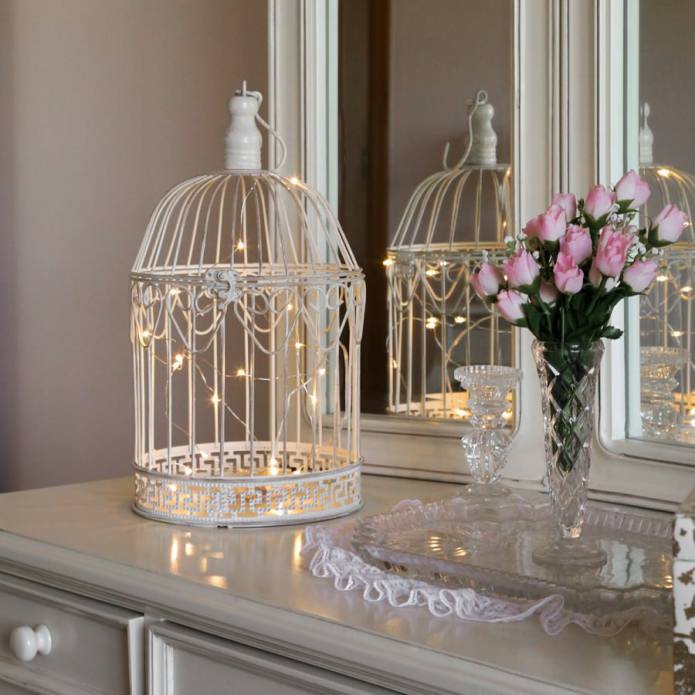 Decorating a candlestick with a garland Decorating a candlestick with a garland