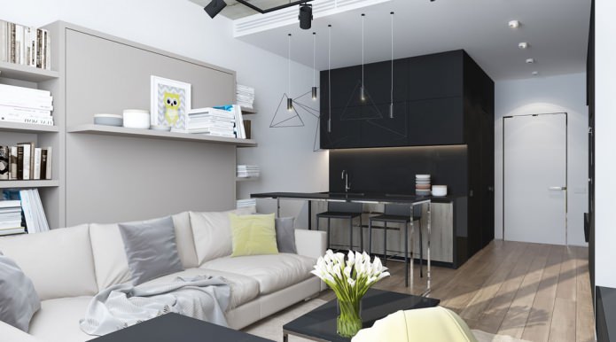Modern design of a living room combined with a kitchen in a studio apartment Modern design of a living room combined with a kitchen in a studio apartment