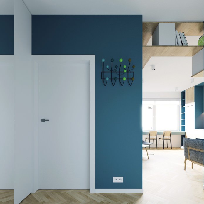 hallway design in white and turquoise colors in a studio apartment