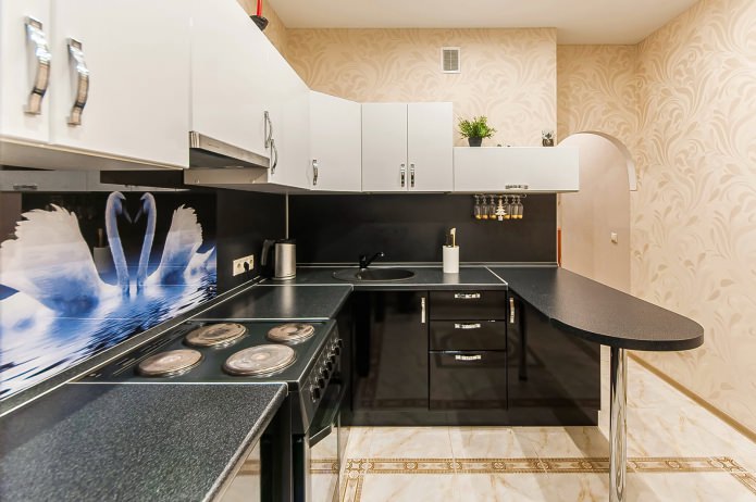 small corner kitchen with a bar