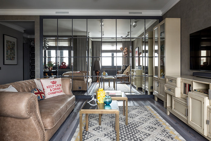 one of the walls is finished with mirror tiles