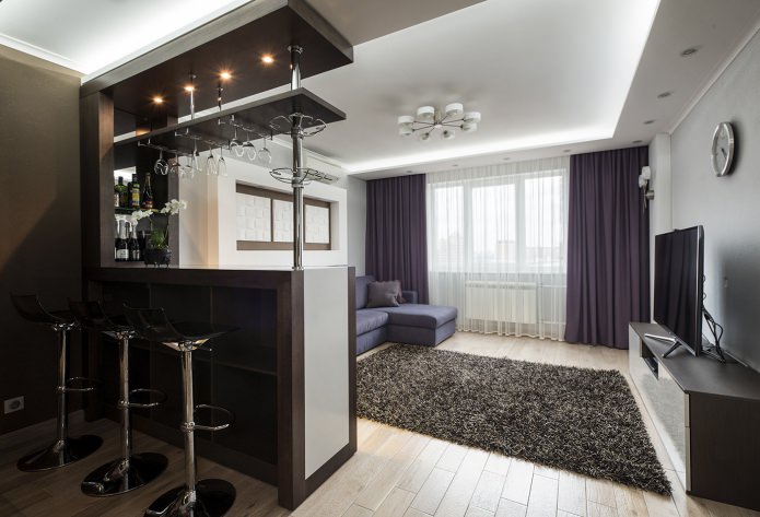 kitchen-living room design with a bar