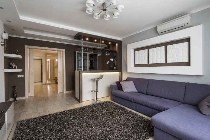 kitchen-living room design with a bar