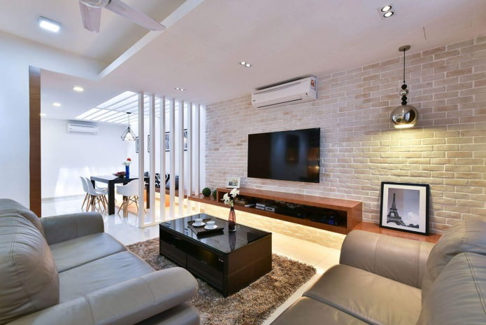 Wallpaper with imitation brick in the interior of the living room Wallpaper with imitation brick in the interior of the living room