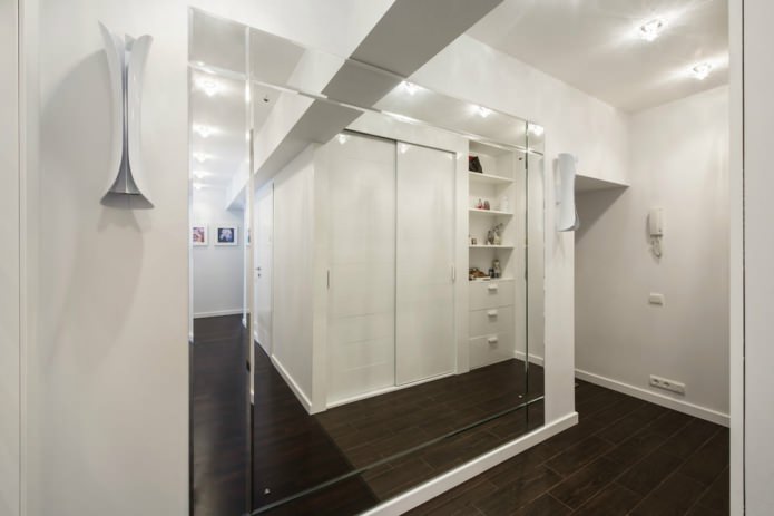 Huge mirror in a bright corridor