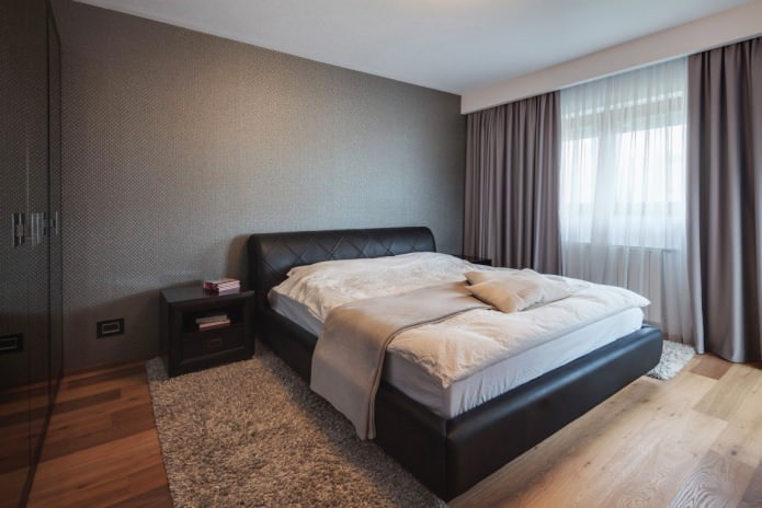 dark gray wallpaper in the bedroom