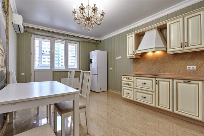 Green wallpaper in the kitchen in a classic style Green wallpaper in the kitchen in a classic style