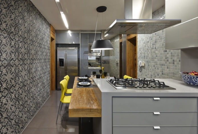 Gray wallpaper with a pattern in the interior of a modern kitchen Gray wallpaper with a pattern in the interior of a modern kitchen