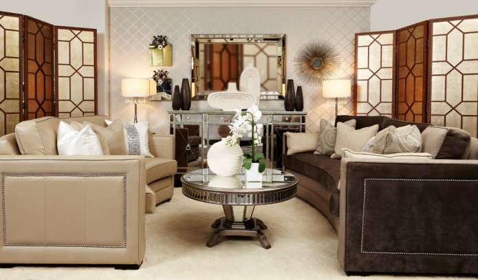 Beige wallpaper with a pattern in the interior of the living room