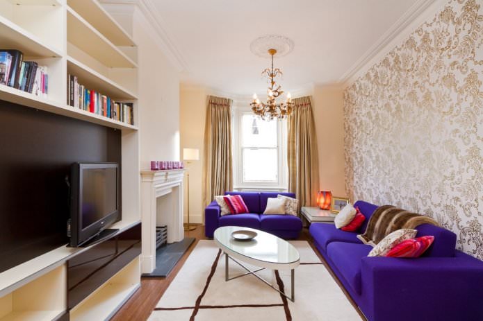 golden curtains with beige wallpaper in the interior of the living room