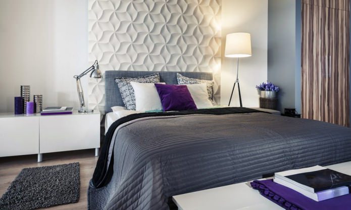 white 3D panels on the wall in the bedroom