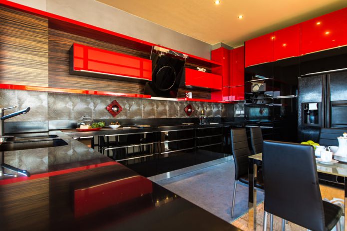 Black and red set in the interior of the kitchen in a modern style Black and red set in the interior of the kitchen in a modern style