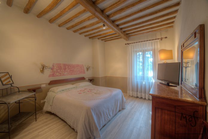 white translucent curtains in the bedroom