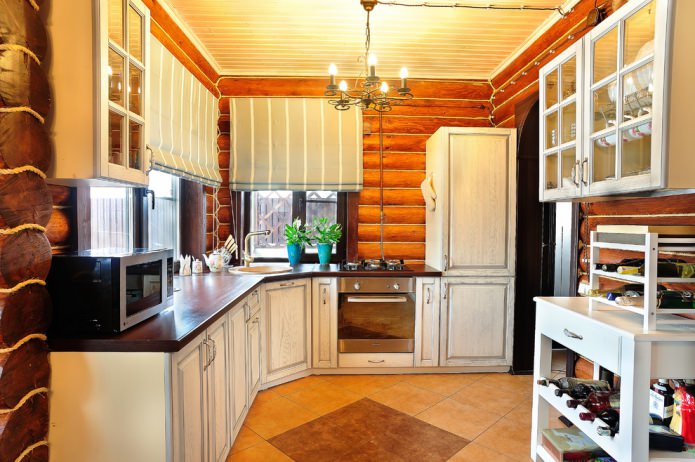 Roman blinds in the interior of a wooden kitchen