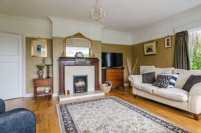 living room with gold walls and fireplace living room with gold walls and fireplace
