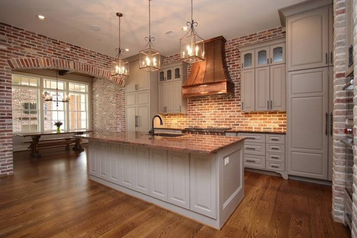 spacious island kitchen in beige tones