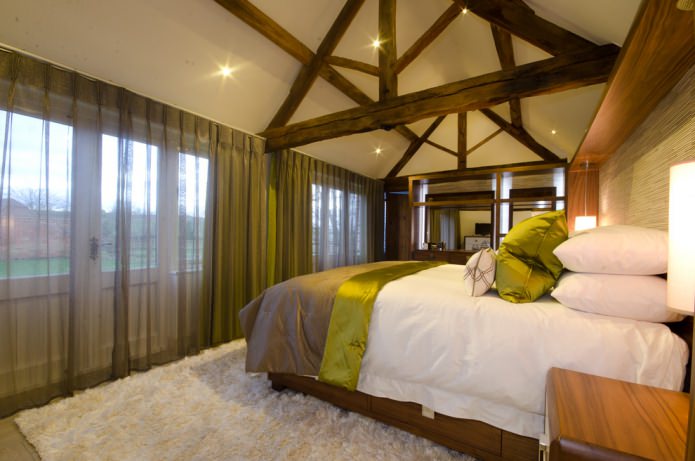 dark tulle in the bedroom with wood beams dark tulle in the bedroom with wood beams