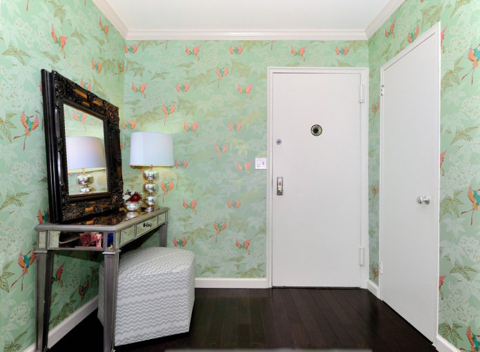 green wallpaper in the hallway