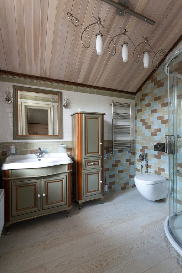 sconce and chandelier in the bathroom