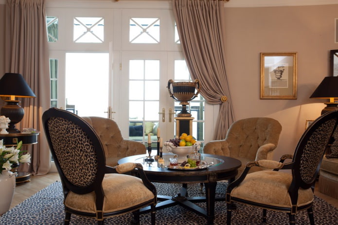 reception area in the hall with a low semi-antique table reception area in the hall with a low semi-antique table