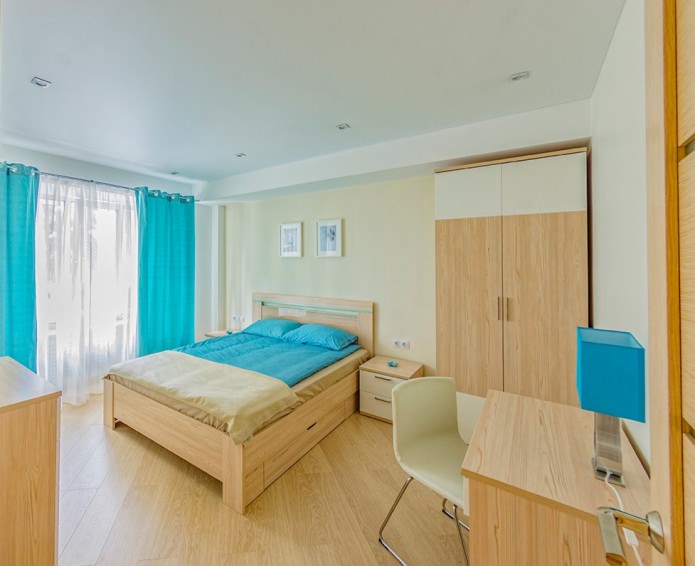 beige interior with turquoise curtains on the eyelets beige interior with turquoise curtains on the eyelets