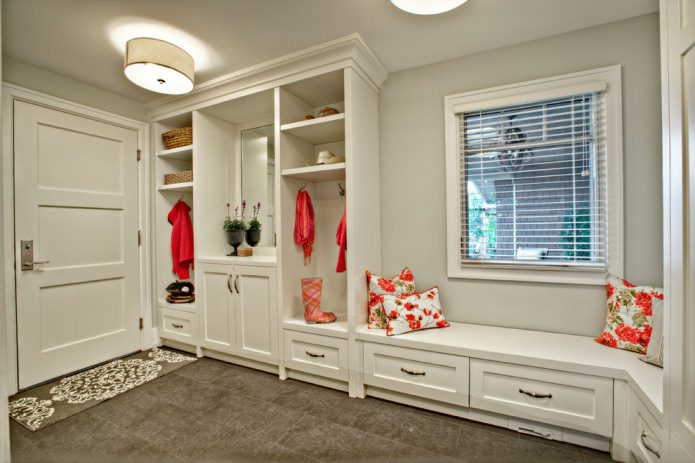 Light gray doors and dark floor in the hallway Light gray doors and dark floor in the hallway