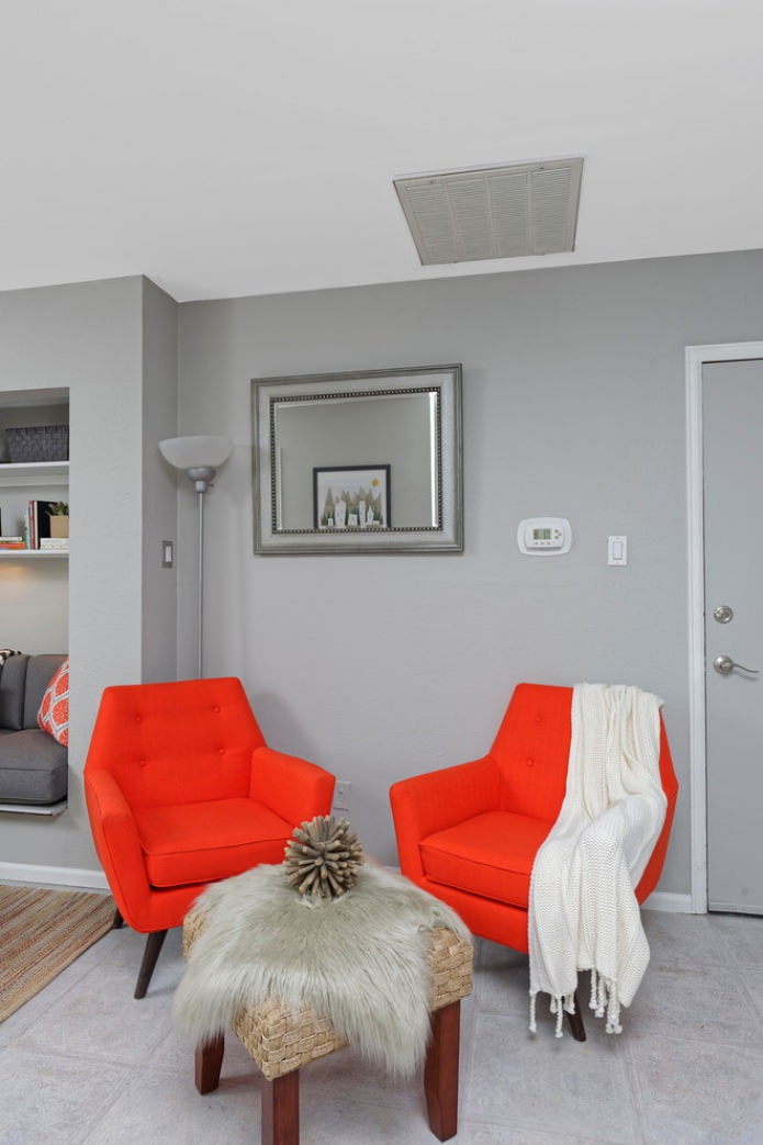 two orange armchairs