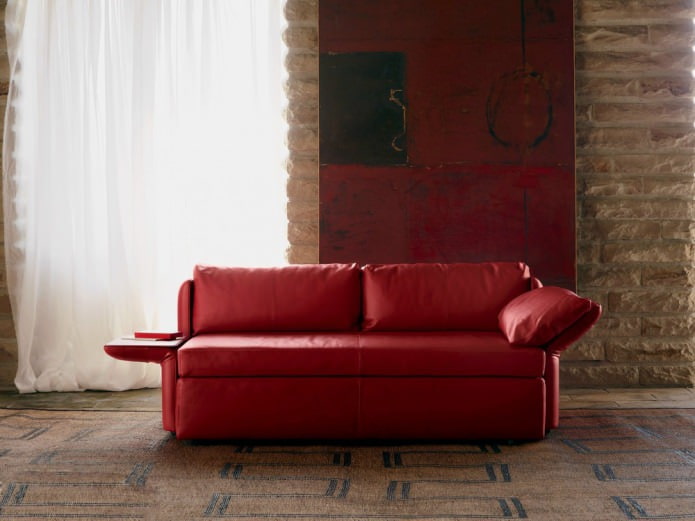 sofa with a table on the armrest sofa with a table on the armrest