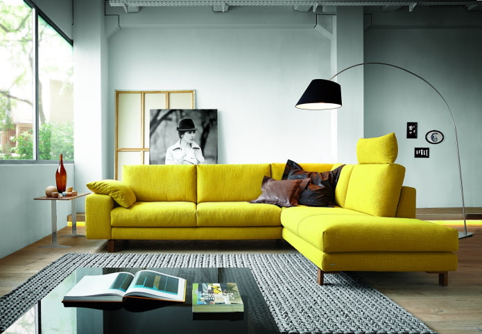 large yellow sofa in the interior large yellow sofa in the interior