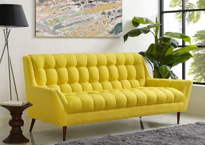 yellow sofa on legs in the interior yellow sofa on legs in the interior