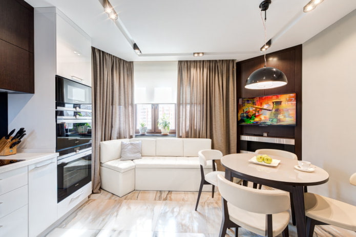 compact white corner sofa in the kitchen
