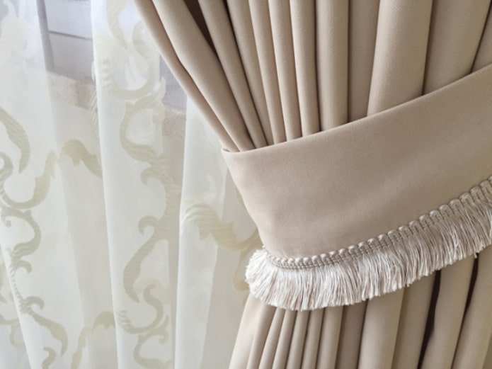 fringed curtain holder