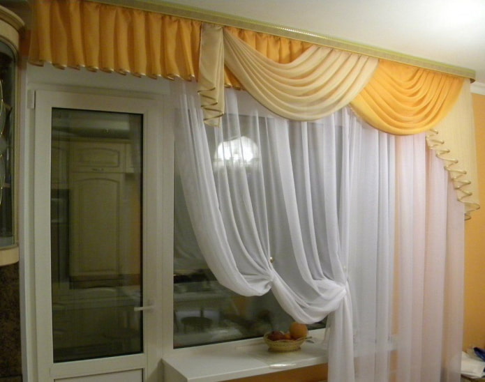 high lambrequin on a window with a balcony