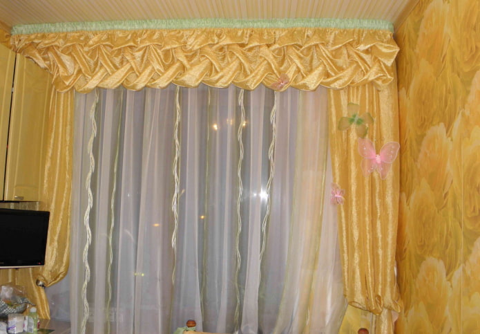 lambrequins with puffs in the interior of the kitchen