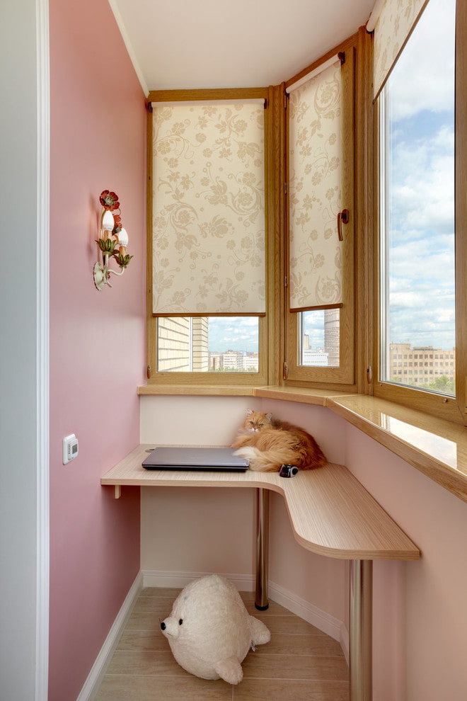 roller blinds with floral patterns on the loggia