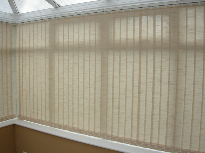 beige vertical blinds on the balcony beige vertical blinds on the balcony
