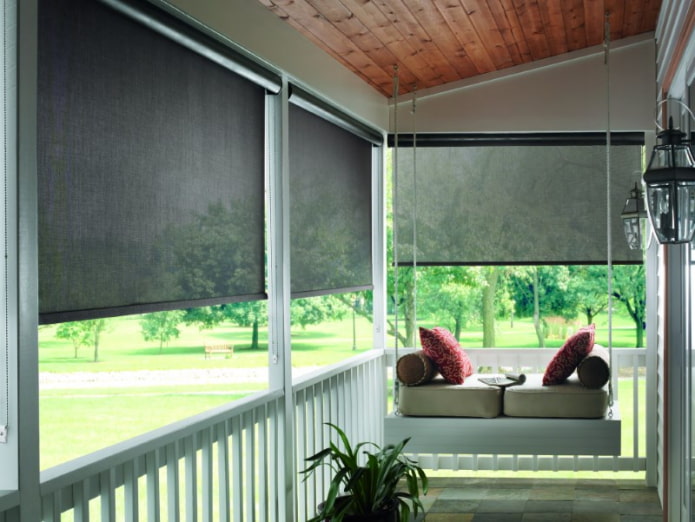 veranda decorated with roller blinds