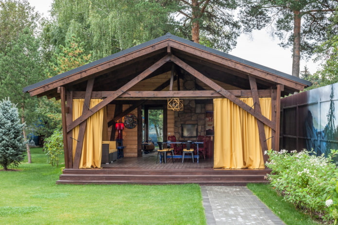 veranda with yellow curtains