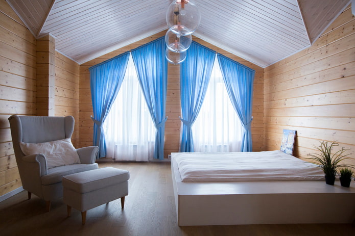 skylights with blue curtains