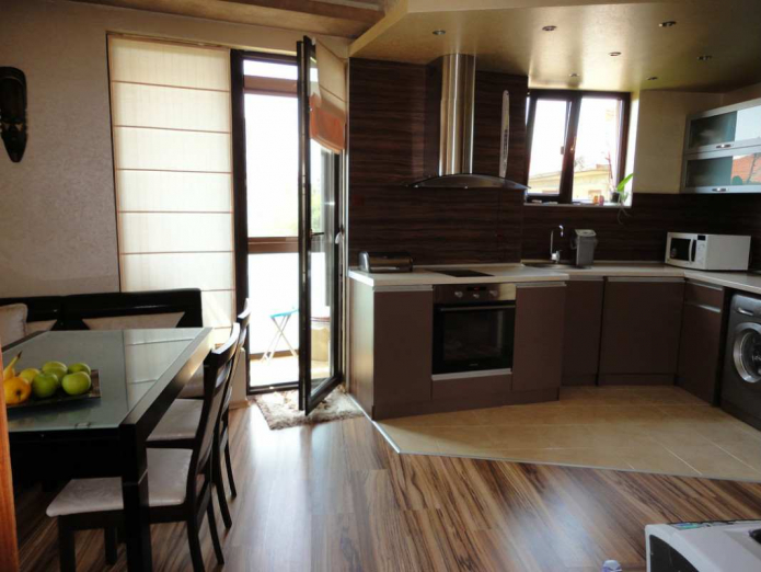 Roman blinds in the kitchen with a balcony Roman blinds in the kitchen with a balcony