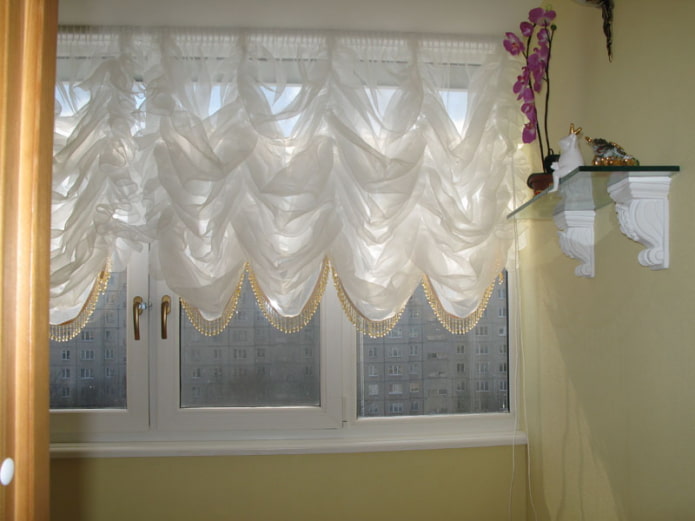 French curtains on the balcony French curtains on the balcony