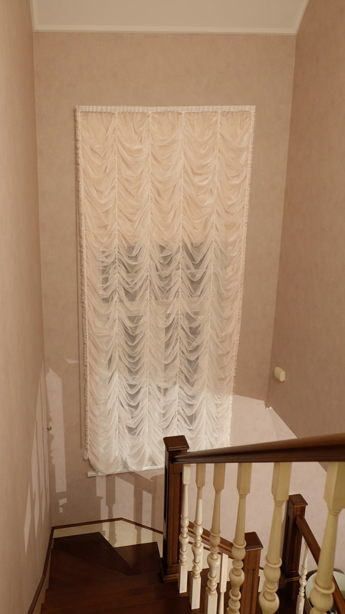 French curtains on the staircase window French curtains on the staircase window
