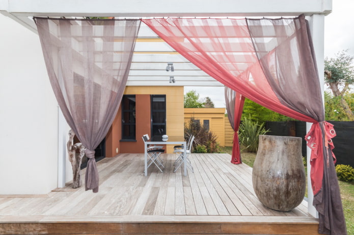 Multi-colored curtains in the gazebo
