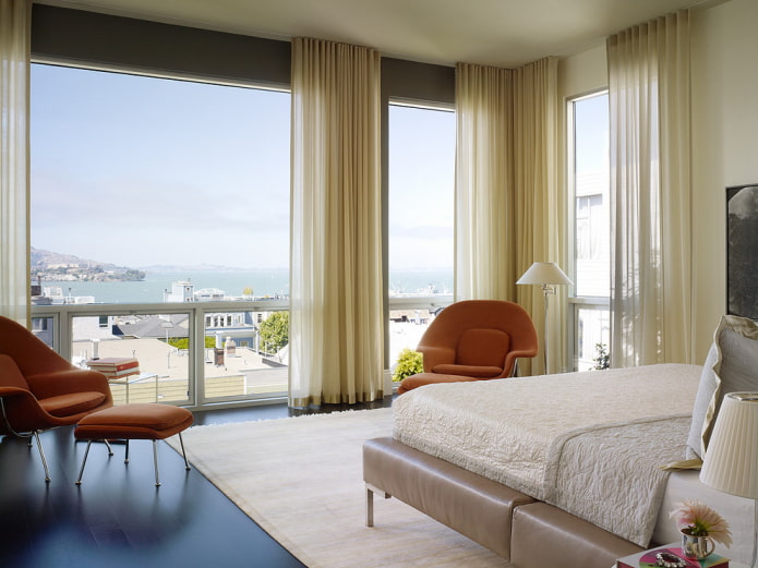 beige curtains in the bedroom