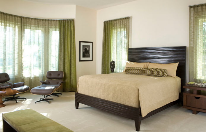 green curtains in the interior of the bedroom
