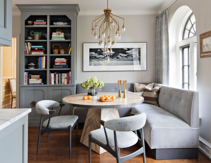 light gray corner sofa in the dining room