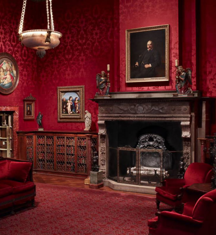 In the photo there is a living room with bright wallpaper.