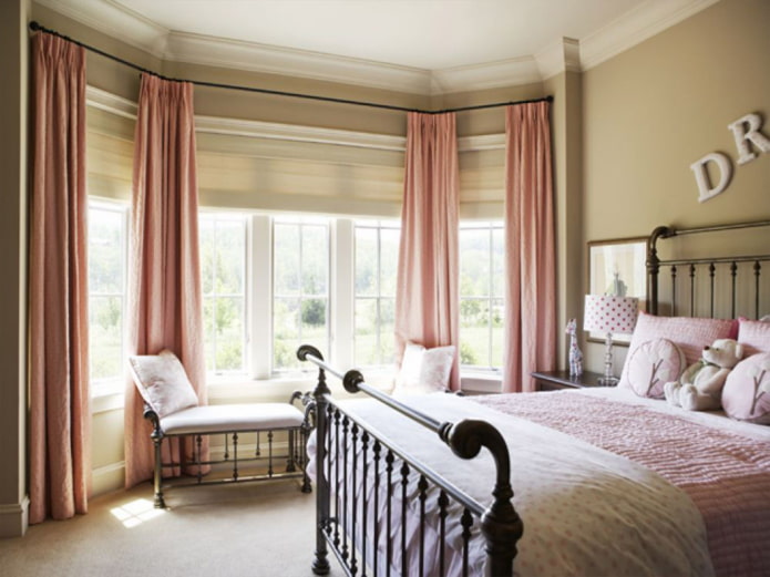 pink curtains on the bay window