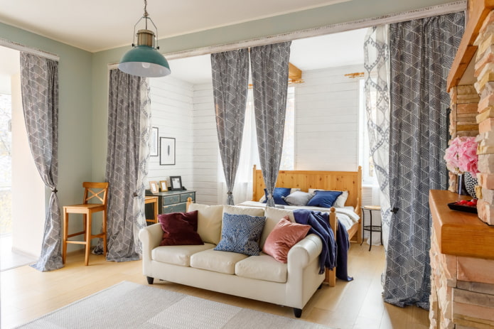 zoning with curtains of the bedroom and living room zoning with curtains of the bedroom and living room